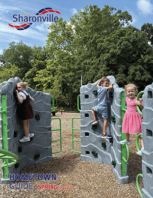 2026 Spring Hometown Guide cover kids climbing rock wall